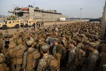 U.S. Marines and Sailors from III Marine Expeditionary Force units muster after disembarking the High-Speed Transport ship USNS Guam (T-HST-1) during a 3rd Marine Logistics Group offload operation as part of Freedom Banner 25 at Pohang Port, South Korea, March 1, 2025.