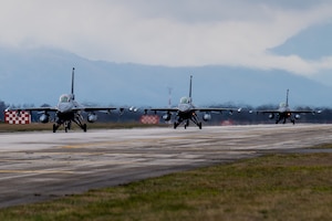 A line of jets on the runway