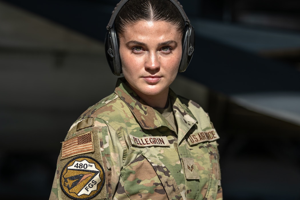 A U.S. Airman looks straight ahead.