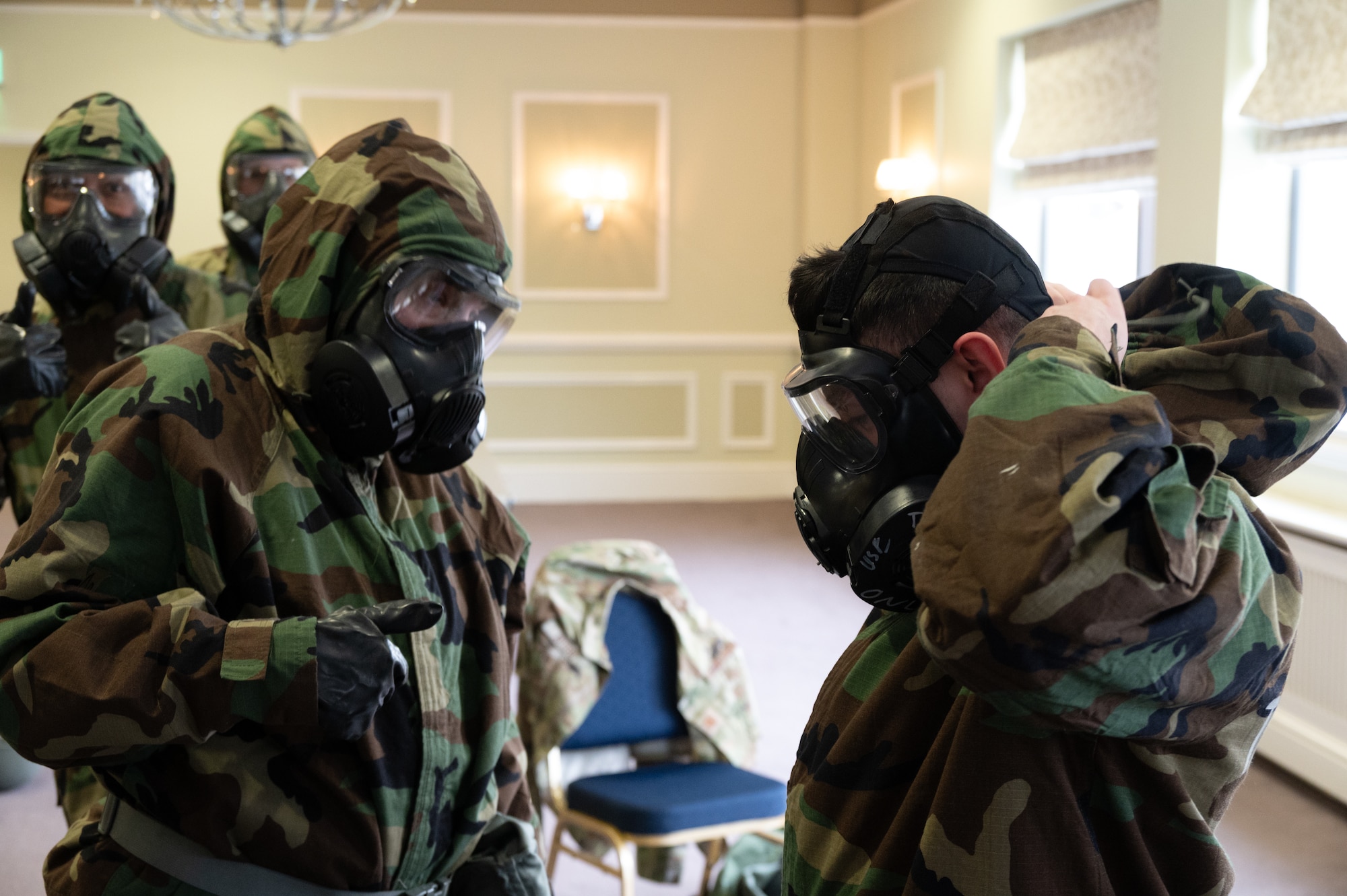 Pathfinders help each other suit up