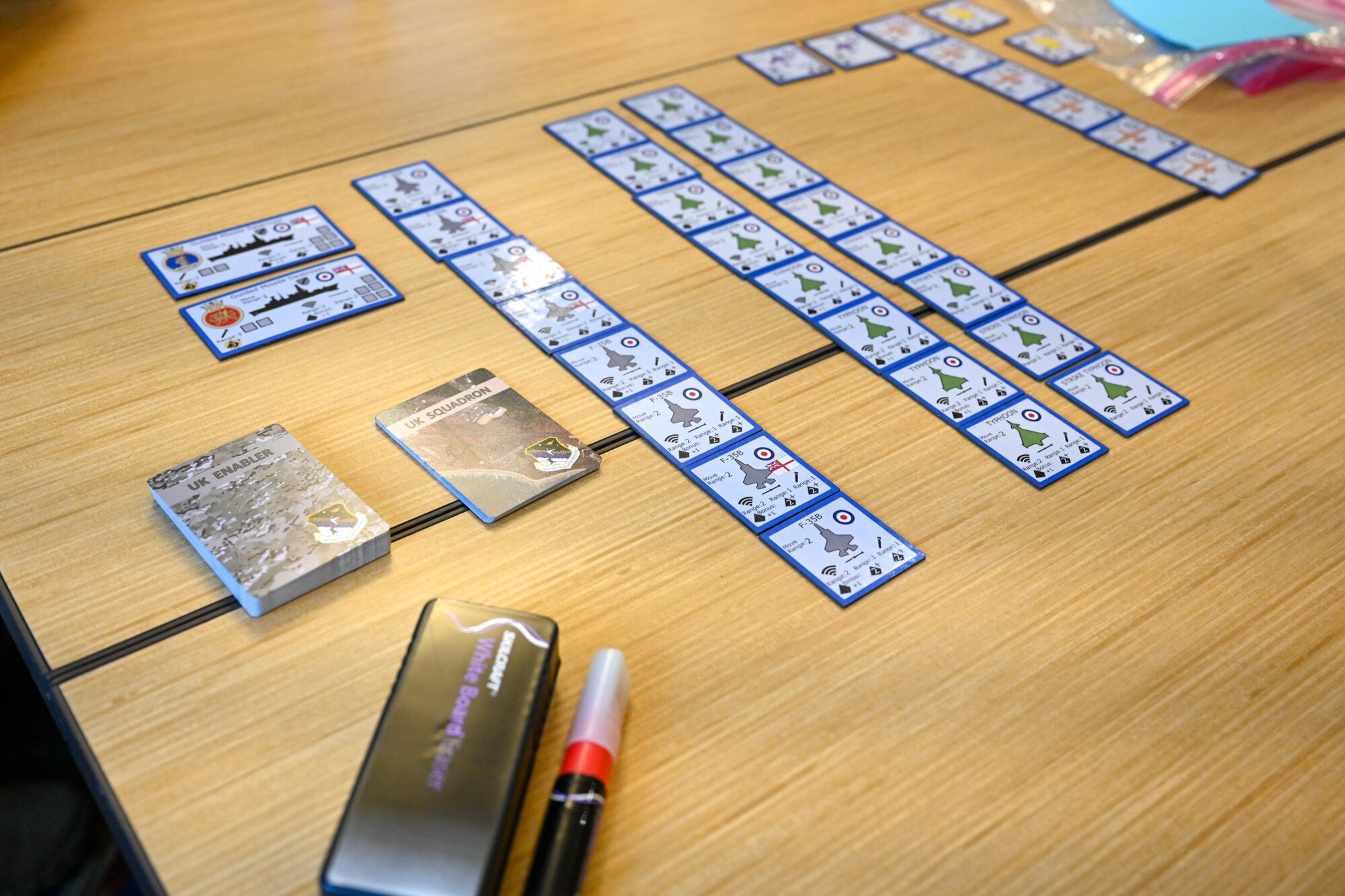 Game pieces for the Air Force Wargame Europe and Indo-Pacific Expansion board games are laid out prior to the start of the game during a professional development seminar at the Armstrong Club on Vogelweh Military Complex, Germany, Feb. 20, 2025.