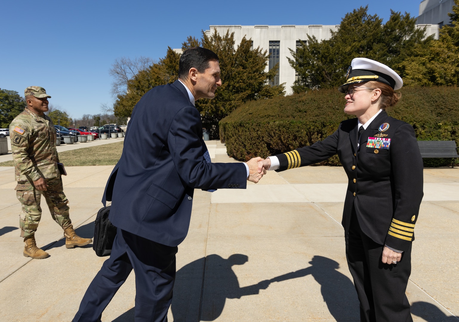 U.S. Navy Capt. Melissa Austin, director of Walter Reed National Military Medical Center, greets Dr. Steve Ferrara, Acting Assistant Secretary of Defense for Health Affairs, during an official visit to the medical center in Bethesda, Md., on March 7. Dr. Ferrara and Darin Selnick, Performing the Duties of the Under Secretary of Defense for Personnel and Readiness, engaged with staff on a range of issues during their visit to Walter Reed. (DOD photo by Ricardo J. Reyes)