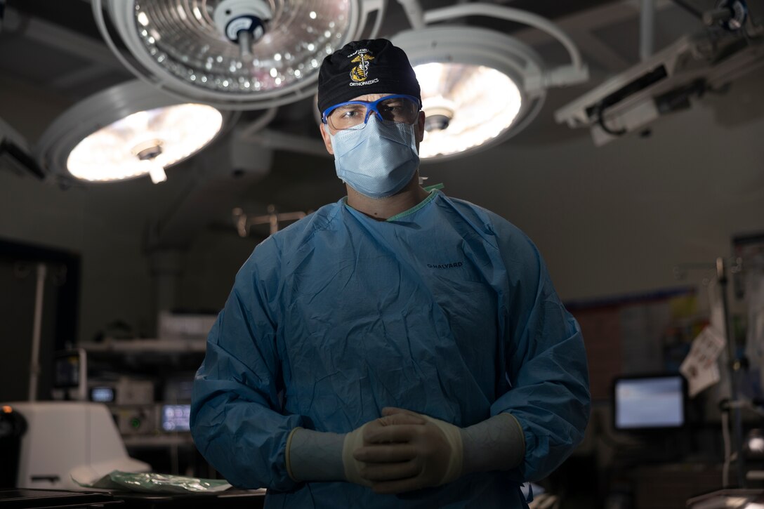 U.S. Navy Hospital Corpsman 2nd Class Joshua Fish with 2nd Medical Battalion, 2nd Marine Logistics Group, poses for a photo at the Naval Medical Center Camp Lejeune, Camp Lejeune, North Carolina, March 6, 2025. Fish was selected as the 2nd MLG Warrior of the Week by his leadership due to his proficiency, maturity, and dedication to his job as a Surgical Technologist, providing 16 hours of Clinical Skills Sustainment to the Naval Medical Center Camp Lejeune operating room. When asked what advice he would give to junior Sailors, Fish said, "Stay humble and open to learning, never settle for complacency, and above all, embrace failure as a steppingstone to growth." Each week, 2nd MLG recognizes one outstanding Marine or Sailor that goes above and beyond in their duties and embodies the qualities of an outstanding service member. (U.S. Marine Corps photo by Lance Cpl. Isabella Ramos)