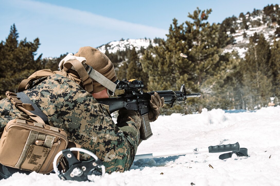 U.S. Marine Corps Lance Cpl. Allen Kirsch, a combat engineer with Combat Logistics Battalion 6, Combat Logistics Regiment 2, 2nd Marine Logistics Group, fires an M16A4 service rifle while participating in a live-fire range with 1st Battalion, 6th Marine Regiment, 2d Marine Division, during Mountain Training Exercise 2-25 at Marine Corps Mountain Warfare Training Center Bridgeport, California, March 9, 2025. MTX 2-25 is designed to prepare units to strengthen expeditionary warfare tactics and build confidence in their abilities to operate in a cold weather, high-altitude, mountainous environment. (U.S. Marine Corps photo by Sgt. Mary Torres)
