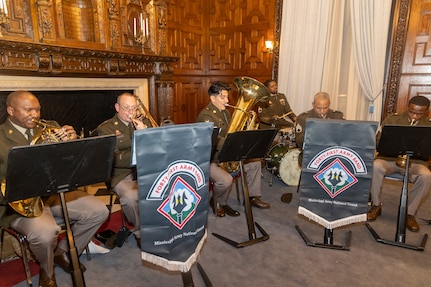 Musicians of the 41st Army Band, Mississippi Army National Guard, perform during the 33rd anniversary of Uzbekistan’s Armed Forces Day Celebration at the Embassy of Uzbekistan in Washington Jan. 31, 2025. U.S. and Uzbekistan officials recognized their state partnership and cooperation in defense and security.