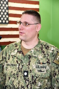 Cmdr. Brian Banazwki recently became Norfolk Navy Shipyard’s Business and Strategic Planning Officer (Code 1200). The Business and Strategic Planning Office could be considered as the front office of the shipyard. Any business coming into or leaving the shipyard comes through Code 1200. It's the new work, availabilities and other things that the shipyard works on. Outside stakeholders and outside customers, everything goes through the business office, which gets planned through the rest of the shipyard, executed, and then leaves the shipyard as a final product.
