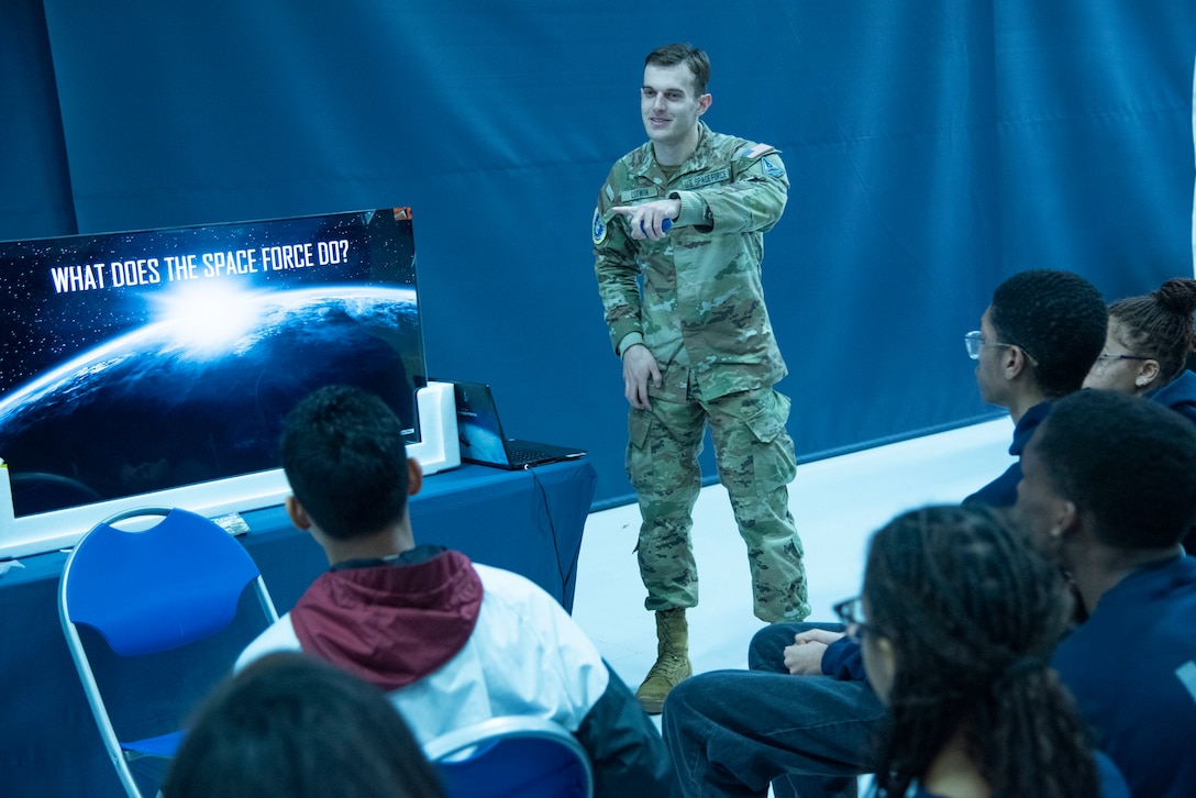 U.S. Space Force 2nd Lt. Noah D. Lotwin, 317th Recruiting Squadron gold bar recruiter, speaks with local high school students about the Space Force’s mission and opportunities during the Seventh Annual Aerospace Summit held at Joint Base Andrews, Md., March 4, 2025. More than 250 students attended the event, which focuses on aviation careers. (U.S. Air Force photo by Patrick Griffith)