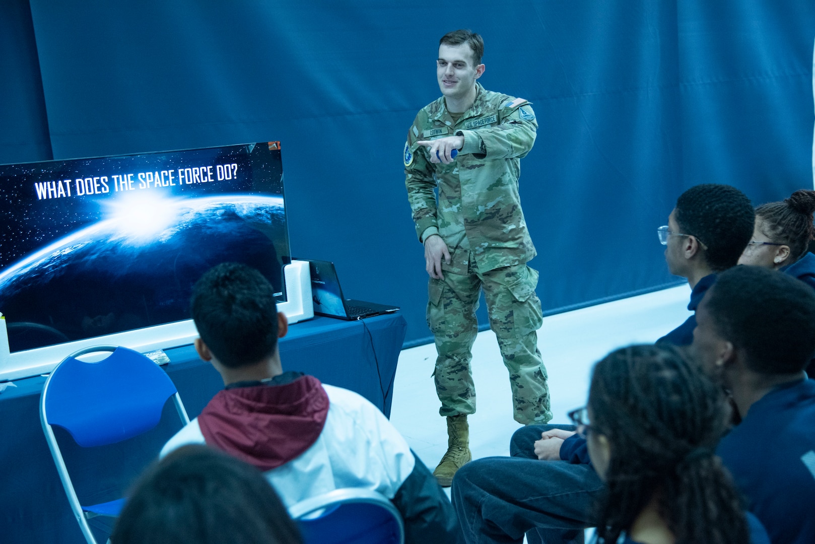 U.S. Space Force 2nd Lt. Noah D. Lotwin, 317th Recruiting Squadron gold bar recruiter, speaks with local high school students about the Space Force’s mission and opportunities during the Seventh Annual Aerospace Summit held at Joint Base Andrews, Md., March 4, 2025. More than 250 students attended the event, which focuses on aviation careers. (U.S. Air Force photo by Patrick Griffith)