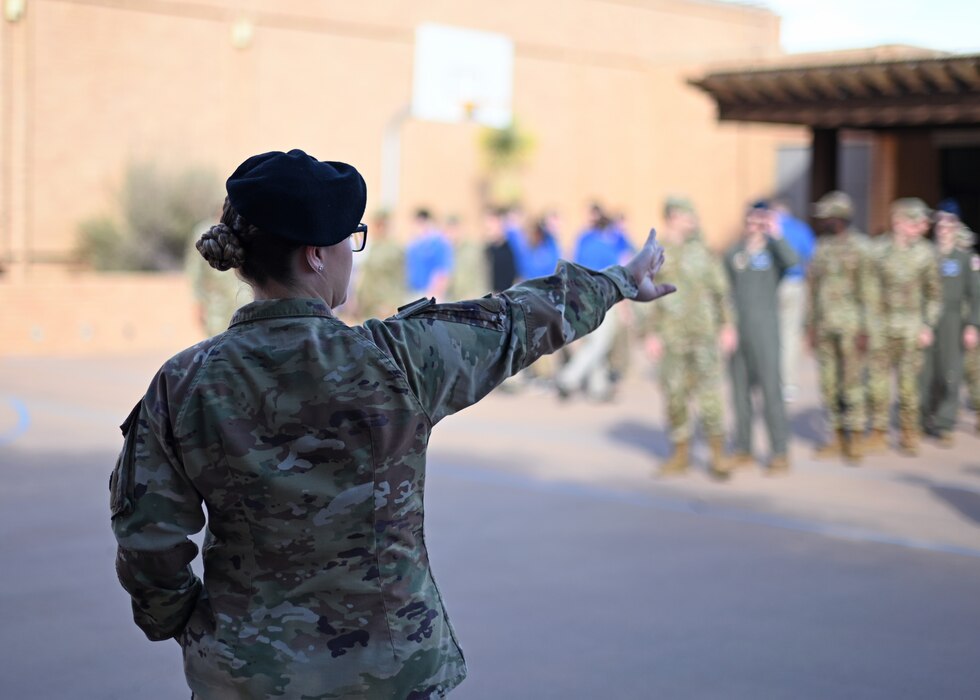 U.S. Air Force Tech. Sgt. Madyson Grace Lavender, 17th Security Forces Squadron Defender, instructs Angelo State University ROTC Air Force Detachment 847 cadets at ASU, San Angelo, Texas, Feb. 26, 2025. 17th Security Forces Squadron Defenders trained the cadets to look for signs of explosives and hidden enemies in preparation for their upcoming field training exercise. (U.S. Air Force photo by Staff Sgt. Ethan Sherwood)