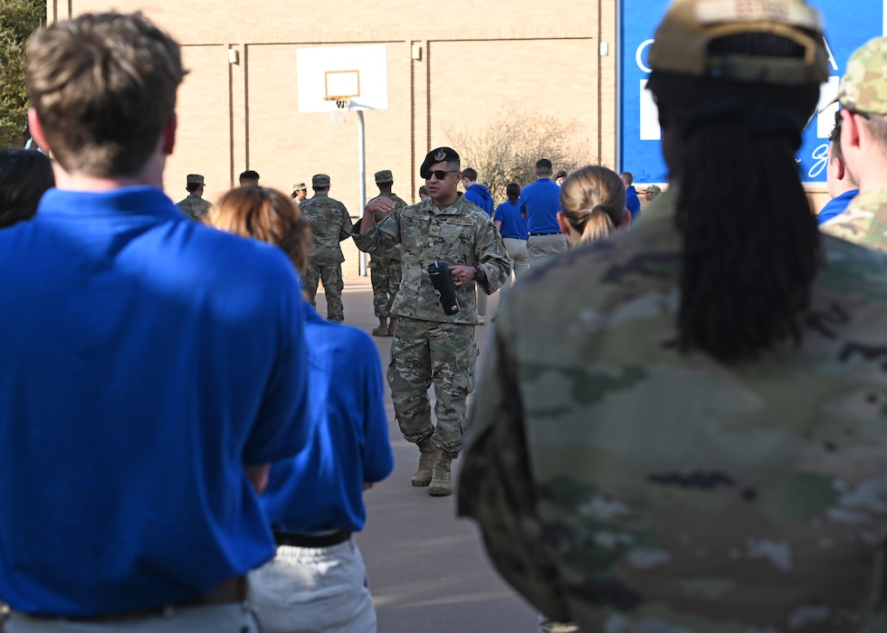 U.S. Air Force Staff Sgt. Robert Madrid, 17th Security Forces Squadron Defender, debriefs Angelo State University ROTC Air Force Detachment 847 cadets after combat tactics training at ASU, San Angelo, Texas, Feb. 26, 2025. Madrid led the cadets through a series of exercises, preparing them for the upcoming field training exercise. (U.S. Air Force photo by Staff Sgt. Ethan Sherwood)