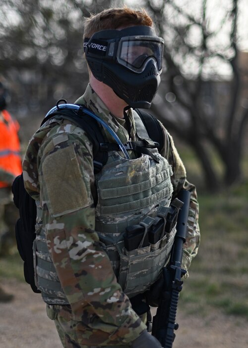An Angelo State University ROTC Air Force Detachment 847 cadet scans his surroundings while in a convoy at the field training exercise on Goodfellow Air Force Base, Texas, March 7, 2025. 17th Security Forces Squadron Defenders explained the most efficient ways to move in a hostile environment to prepare the cadets for their exercise. (U.S. Air Force photo by Staff Sgt. Ethan Sherwood)