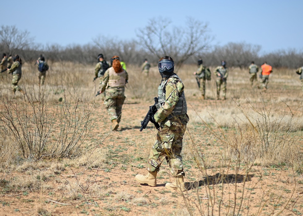 An Angelo State University ROTC Air Force Detachment 847 cadet searches for threats during the search and rescue operation at the field training exercise on Goodfellow Air Force Base, Texas, March 7, 2025. Cadets were tasked with finding a downed pilot in a hostile area and safely extracting their target. (U.S. Air Force photo by Staff Sgt. Ethan Sherwood)