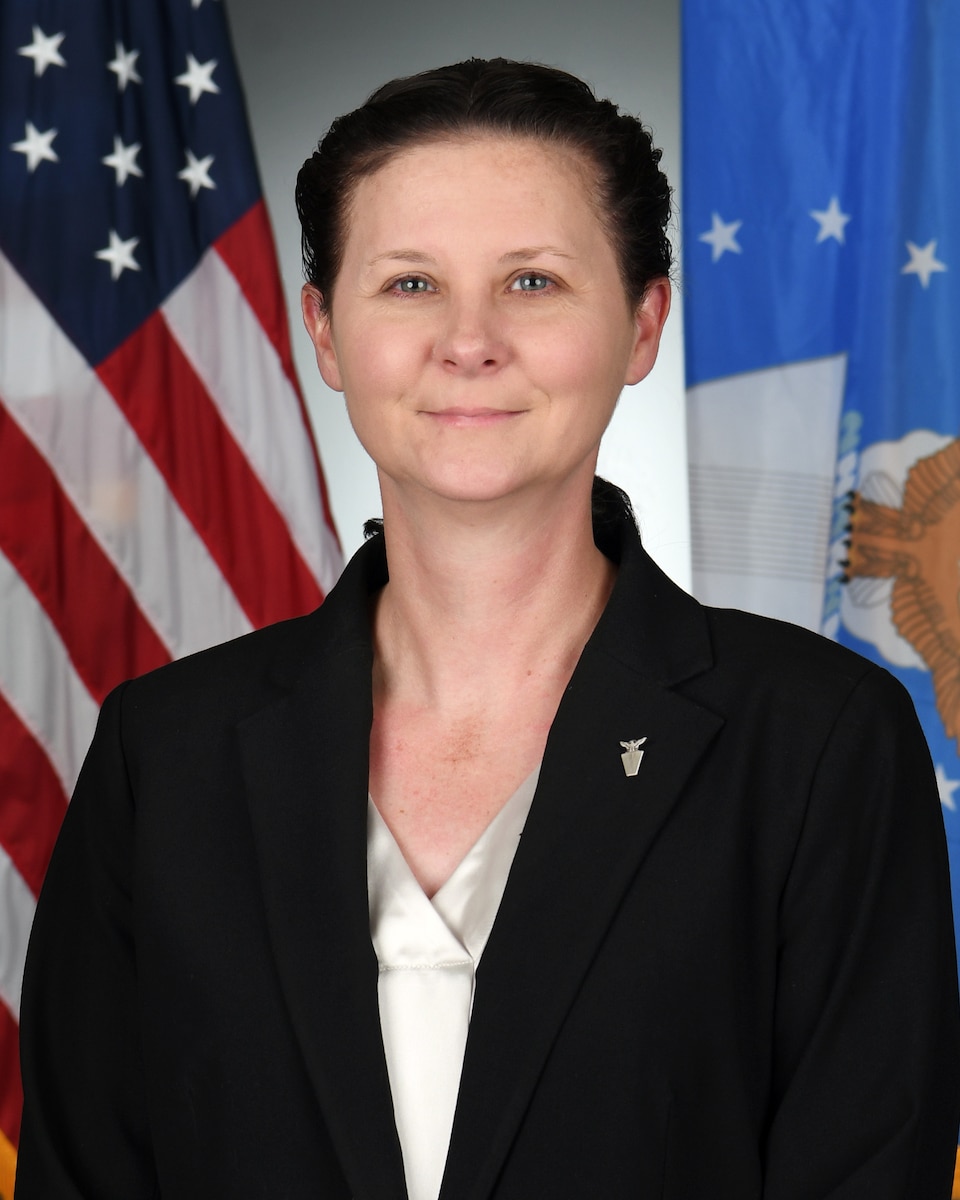 Civilian poses for a portrait