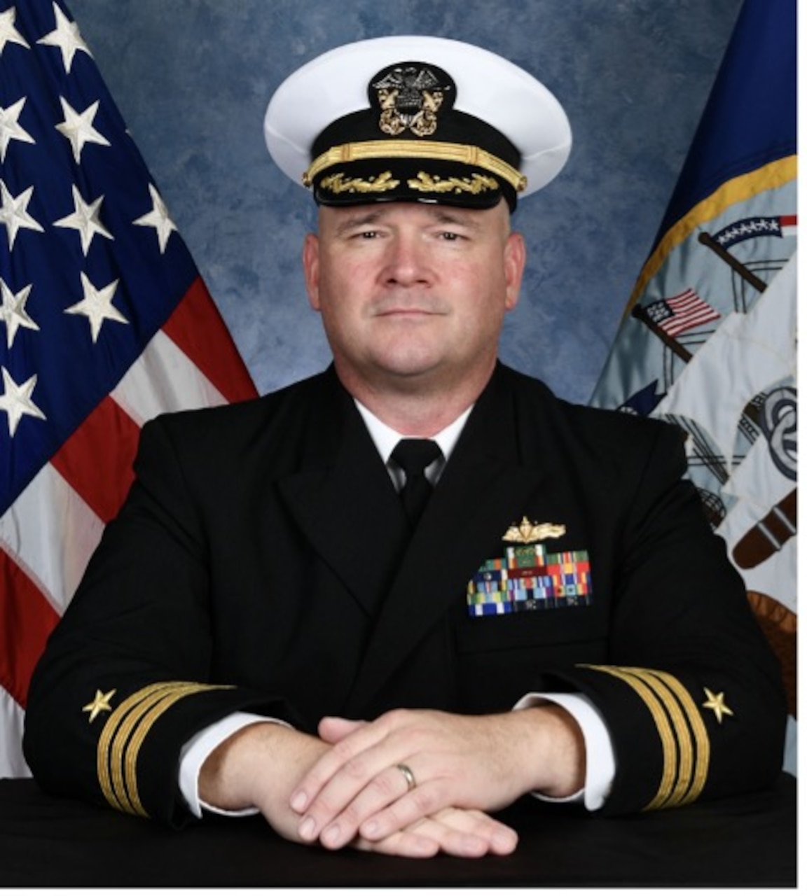 Cmdr. TIMOTHY L. BELL