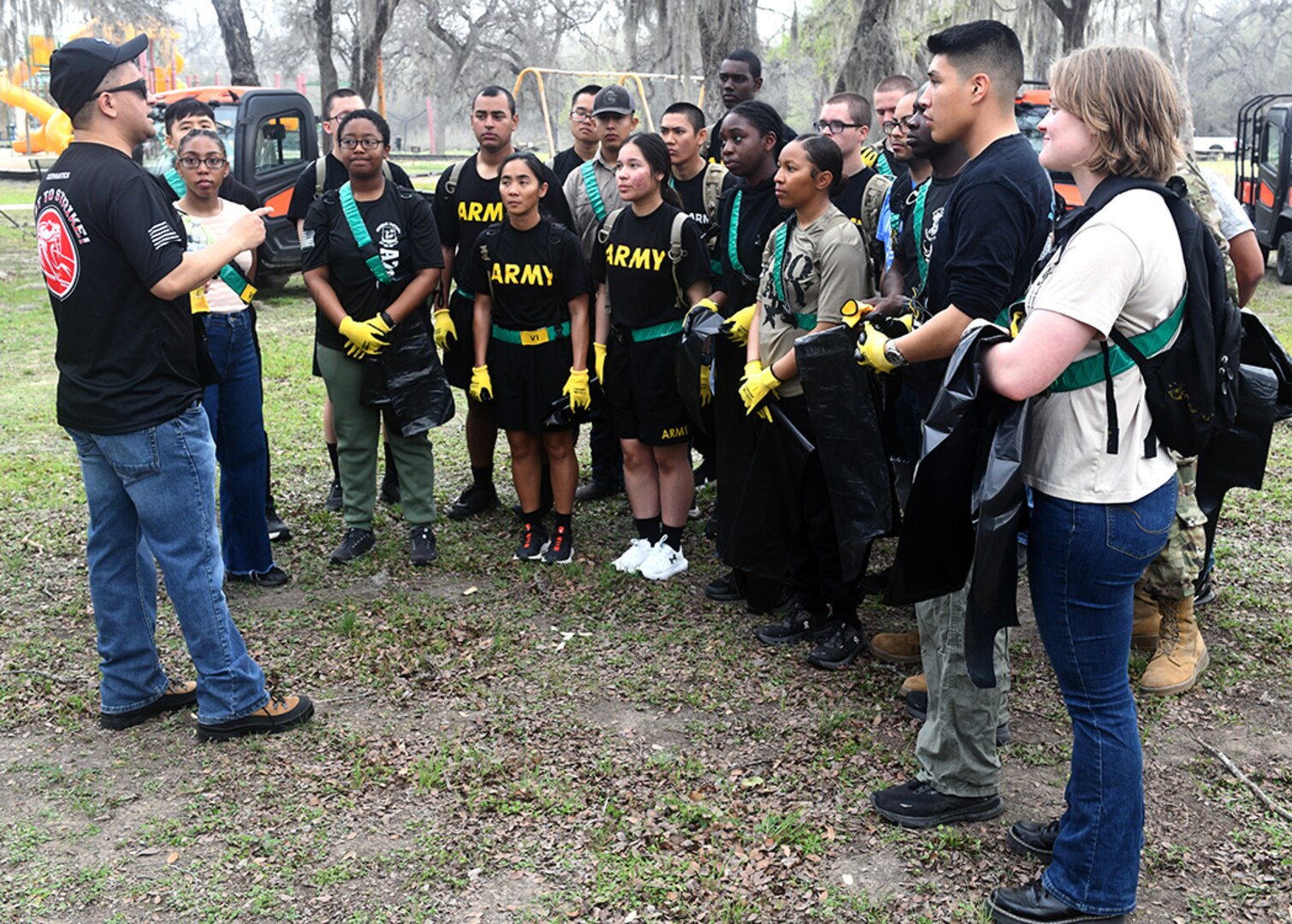 Warm weather brings out huge crowd for annual Basura Bash creek cleanup