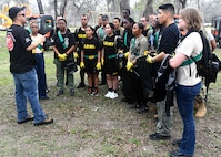 Warm weather brings out huge crowd for annual Basura Bash creek cleanup