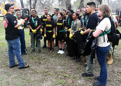 Warm weather brings out huge crowd for annual Basura Bash creek cleanup