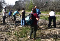 Warm weather brings out huge crowd for annual Basura Bash creek cleanup