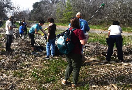 Warm weather brings out huge crowd for annual Basura Bash creek cleanup