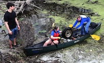 Warm weather brings out huge crowd for annual Basura Bash creek cleanup