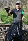 Warm weather brings out huge crowd for annual Basura Bash creek cleanup