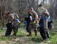 Warm weather brings out huge crowd for annual Basura Bash creek cleanup
