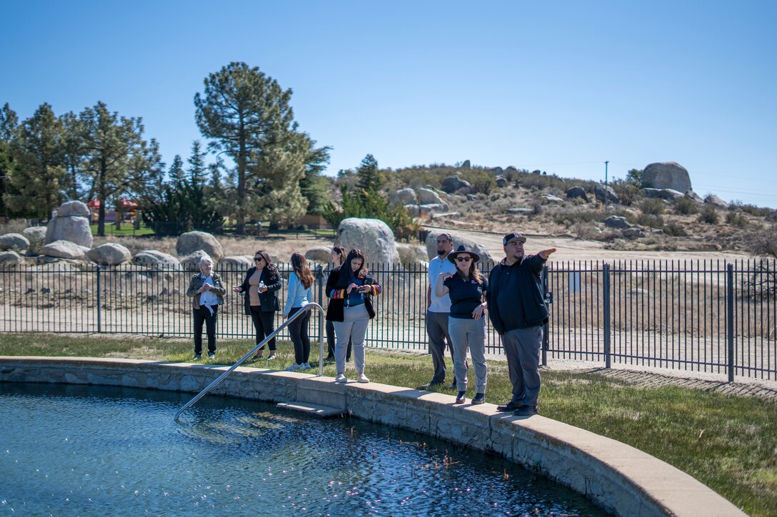 Members of U.S. Army Corps of Engineers Los Angeles District and the Cahuilla Band of Indians take time to survey the site of the Cahuilla Hot Springs near Anza, California, minutes after a Feasibility Cost Share Agreement signing ceremony Feb. 26, as part of an effort to restore the site.