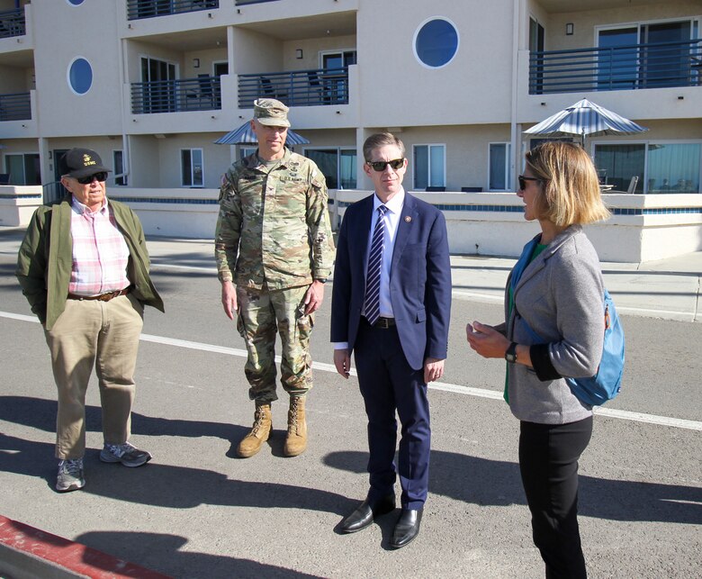 U.S. Army Corps of Engineers Los Angeles District commander Col. Andrew Baker, second from left, and California’s 49th Congressional District Rep. Mike Levin, second from right, speak with Jayme Timberlake, City of Oceanside coastal zone administrator, right, during a Feb. 20 meeting in Oceanside, California. At left is Matt Caulfield, Save Oceanside Sand military liaison.