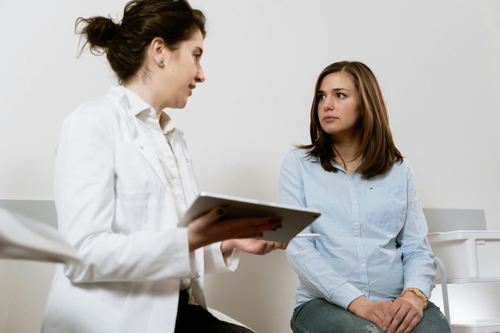 Doctor talking with a patient.