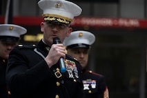 U.S. Marine Maj. Branden Koonce, the commanding officer of Marine Corps Recruiting Station Chicago, gives remarks at a wreath laying ceremony in honor of the 80th anniversary of the flag raising on Iwo Jima in Chicago, Ill., Feb. 23, 2025. Koonce gave a speech honoring those that fought at the Battle of Iwo Jima, remarking on the lasting impact those Marines had on the Marine Corps and the Nation. (U.S. Marine Corps photo by Sgt. Dalton J. Payne)