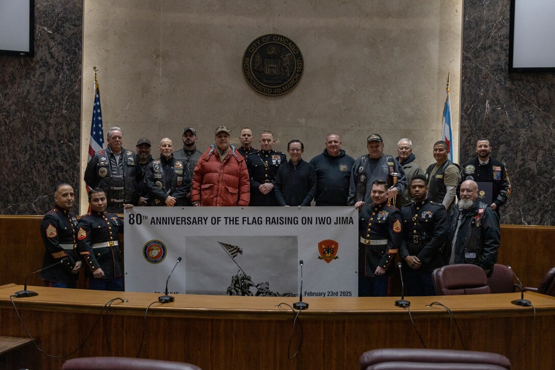 U.S. Marines and City of Chicago officials pose for a group photo in the City of Chicago Council Chambers after a wreath laying ceremony in honor of the 80th anniversary of the flag raising on Iwo Jima in Chicago, Ill., Feb. 23, 2025. Balcer is a Vietnam veteran, former Alderman of the 11th Ward of the City of Chicago, and active member of the veteran community in Chicagoland. (U.S. Marine Corps photo by Sgt. Dalton J. Payne)