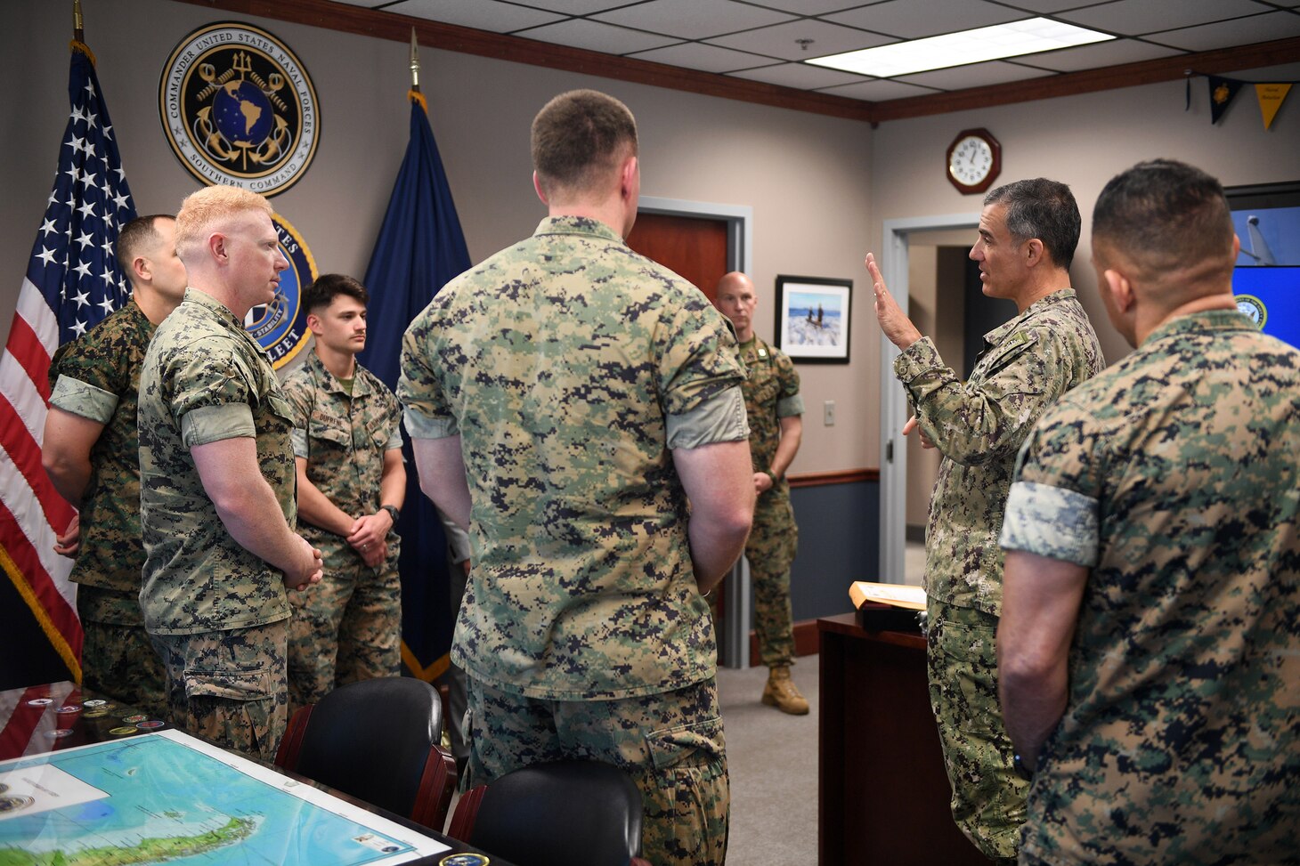 Rear Adm. Carlos Sardiello, commander, U.S. Naval Forces Southern Command/U.S. 4th Fleet, discusses the exercise Integrated Advance 2025 with Marines participating as part of the Joint Force Maritime Component Commander (JFMCC). Sailors and Marines are serving together for the Joint Force Maritime Component Commander (JFMCC) during Integrated Advance 2025, working through a contingency scenario in the USSOUTHCOM Area of Responsibility (AOR) to validate warfighting functions and clarify phase transitions at the operational level of war. U.S. Naval Forces Southern Command/U.S. 4th Fleet is the trusted maritime partner for Caribbean, Central and South America maritime forces leading to improved unity, security and stability.
