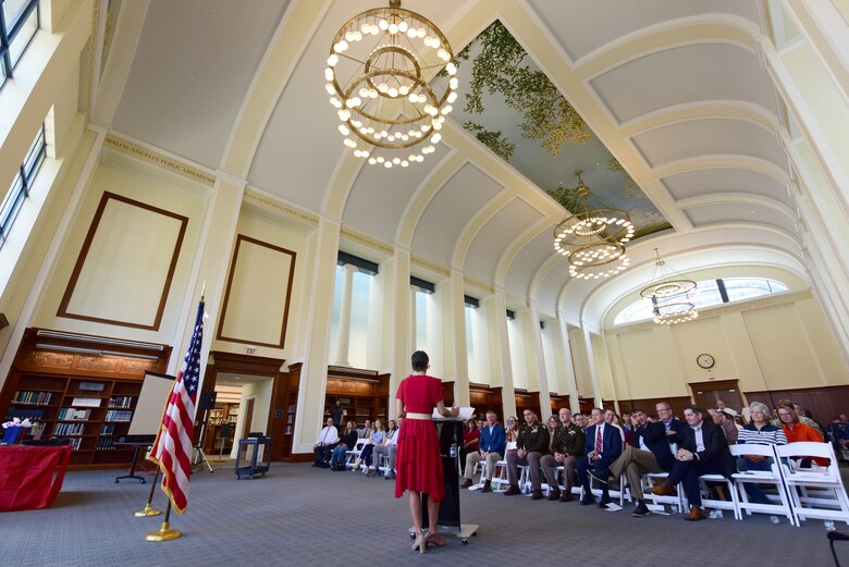 Joanne Mann, U.S. Army Corps of Engineers Nashville District executive officer and congressional liaison, addresses guests at the conclusion of her retirement ceremony March 12, 2025, in the Nashville Public Library Reading Room in Nashville, Tennessee. Mann culminates 38 years of federal service. (USACE Photo by Lee Roberts)