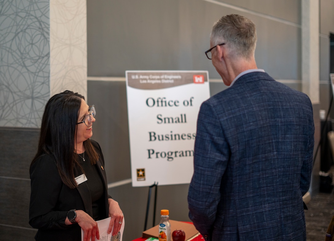 Stephanie Parra, procurement analyst with the U.S. Army Corps of Engineers Albuquerque District’s Office of Small Business Program, left, speaks with an attendee of the 2025 Business Opportunities Open House, which the LA District hosted March 6 in Montebello, California.