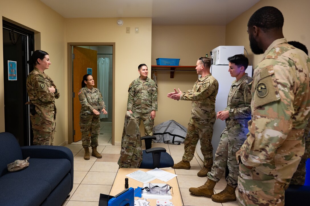 U.S. Army Master Sgt. Luziano Chavez and Sgt. Eunice Perez, Joint Task Force-Bravo Sexual Assault Response Coordinators, speak with 228th Aviation Battalion members after completing a challenge room during a Resiliency Round Robin at Soto Cano Air Base, Honduras, March 11, 2025.