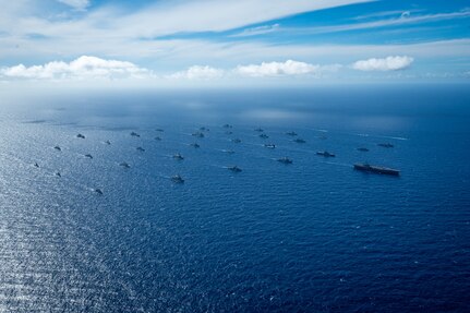 Multinational ships sail in formation July 22, off the coast of Hawaii during Exercise Rim of the Pacific (RIMPAC) 2024. Twenty-nine nations, 40 surface ships, three submarines, 14 national land forces, more than 150 aircraft and 25,000 personnel are participating in RIMPAC in and around the Hawaiian Islands, June 27 to Aug. 1.
