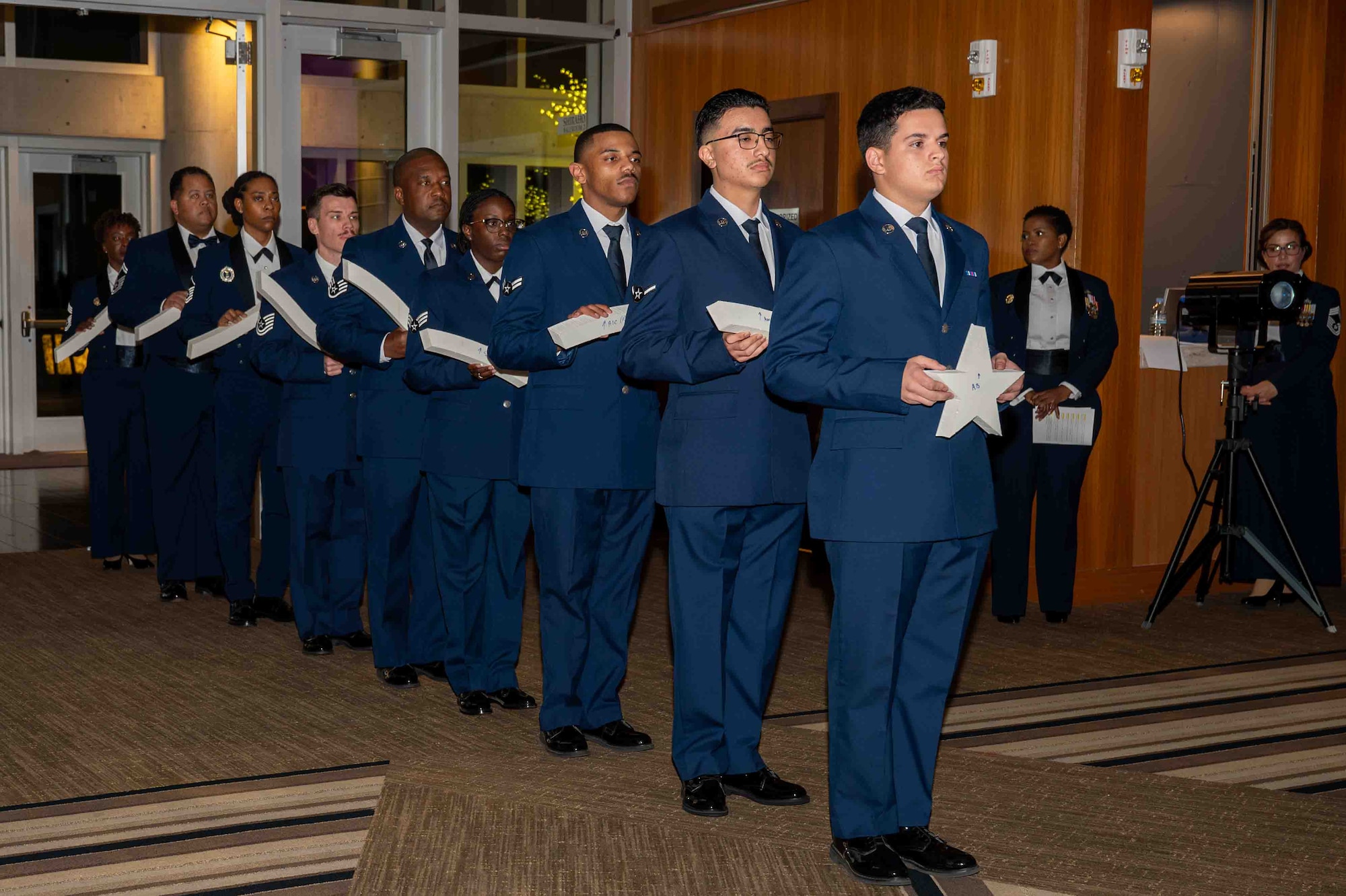 Airmen waiting to perform the stripe ceremony at a Chief Induction Ceremony