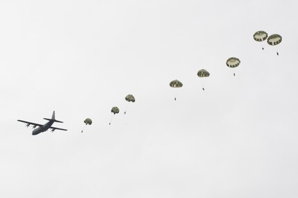 Japan Ground Self-Defense Force paratroopers assigned to the 1st Airborne Brigade descend from a U.S. Air Force C-130J Super Hercules assigned to the 36th Airlift Squadron over JGSDF East Fuji Maneuver Area, Japan, March 4, 2025, during Airborne 25.
