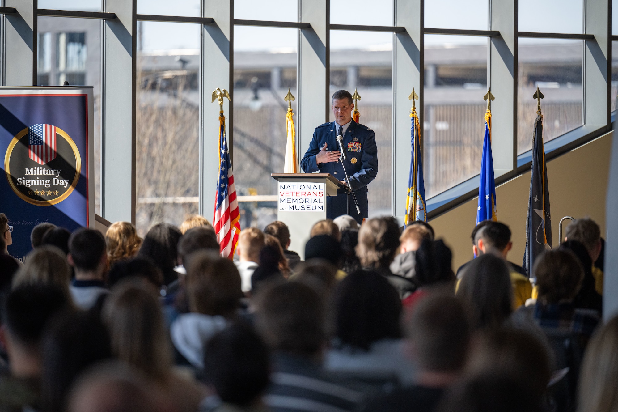 Col. Dustin Richards, 88th Air Base Wing and Installation Commander, addresses approximately 100 junior and senior high school students from 80 schools at the Ohio Military Signing Day at the National Veterans Memorial Museum in Columbus, Ohio, March 11, 2025.