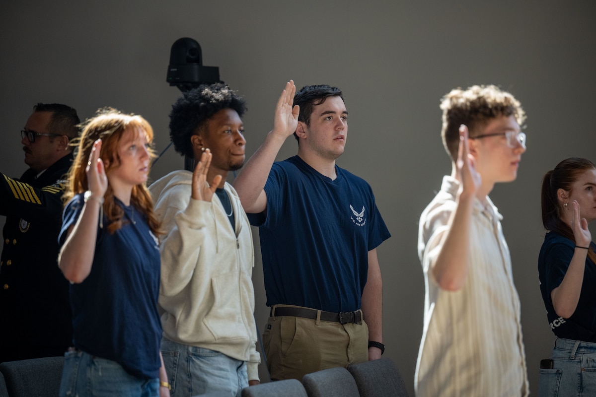 tudents stand and give the Oath of Enlistment at the Ohio Military Signing Day at the National Veterans Memorial Museum in Columbus, Ohio, March 11, 2025.