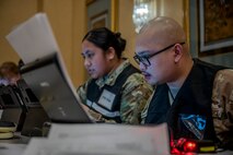 A U.S. Air Force Airman assigned to the 35th Fighter Wing in-processes participants during an Emergency Evacuation Program exercise at Misawa Air Base, Japan, Mar. 11, 2025.