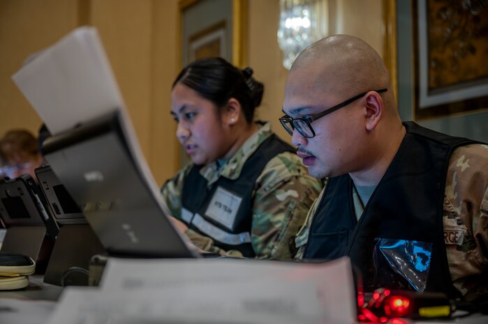 A U.S. Air Force Airman assigned to the 35th Fighter Wing in-processes participants during an Emergency Evacuation Program exercise at Misawa Air Base, Japan, Mar. 11, 2025.