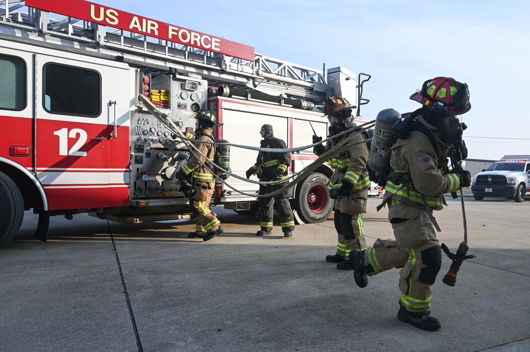 Airmen assigned to the 8th Civil Engineer Squadron fire department respond to an inject during Exercise Freedom Shield 25.