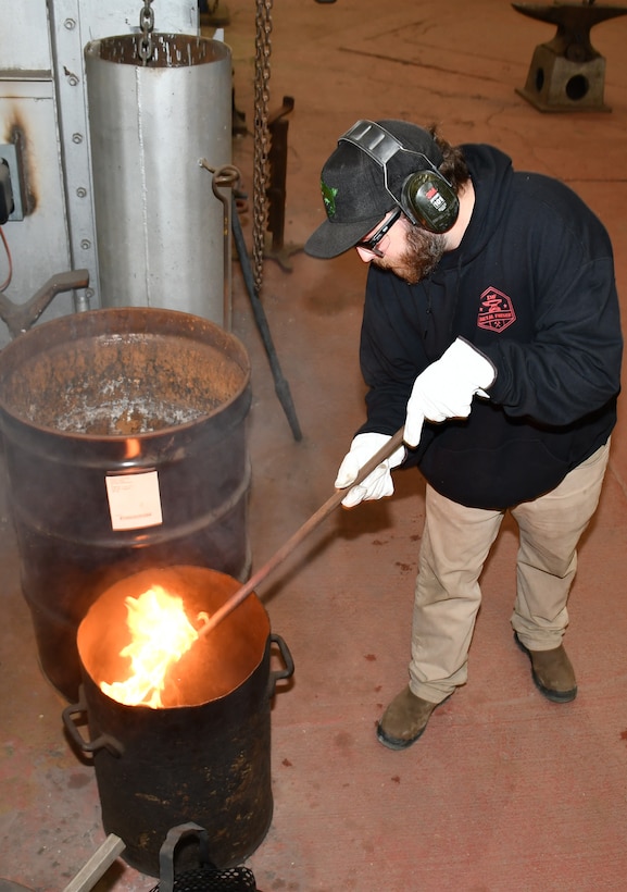 Norfolk Naval Shipyard Metal Forging Shop (Shop 11F) Metal Forger Ian McHorney started his shipyard career in the Shipfitter Shop (Shop 11) approximately 10 years ago. It wasn’t until eight years later that he became a metal forger. “I have always been fascinated with forging. When I had the opportunity to work in Shop 11F, I jumped all over it,” said McHorney. “The job requests are always changing from making a tool one day to inspecting an anchor chain the next. This is what makes the job fun.”