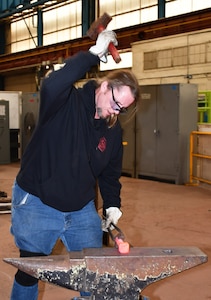 Norfolk Naval Shipyard Metal Forging Shop (Shop 11F) Metal Forger Work Leader Eric Slate enjoys making tools for other shops in order to make their job easier and provide better quality. “We actually have a lot of shops in the vicinity where the mechanics come to us needing a center punch, a pry and other materials and tools they use every day,’ said Slate. “Knowing that Shop 11F can help other shops and codes to perform their job gives me a sense of pride on what I love to do.”