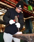 Norfolk Naval Shipyard Metal Forging Shop (Shop 11F) Metal Forger Apprentice Sam Graves has been at NNSY for six months. Graves became an apprentice, looking for a steady job where he could learn a new skill. “Currently I am doing a lot of shadowing, watching how the shop does its job and how to do it safe,” said Graves. “I’m looking forward to get into the grind of things to start learning by doing.”
