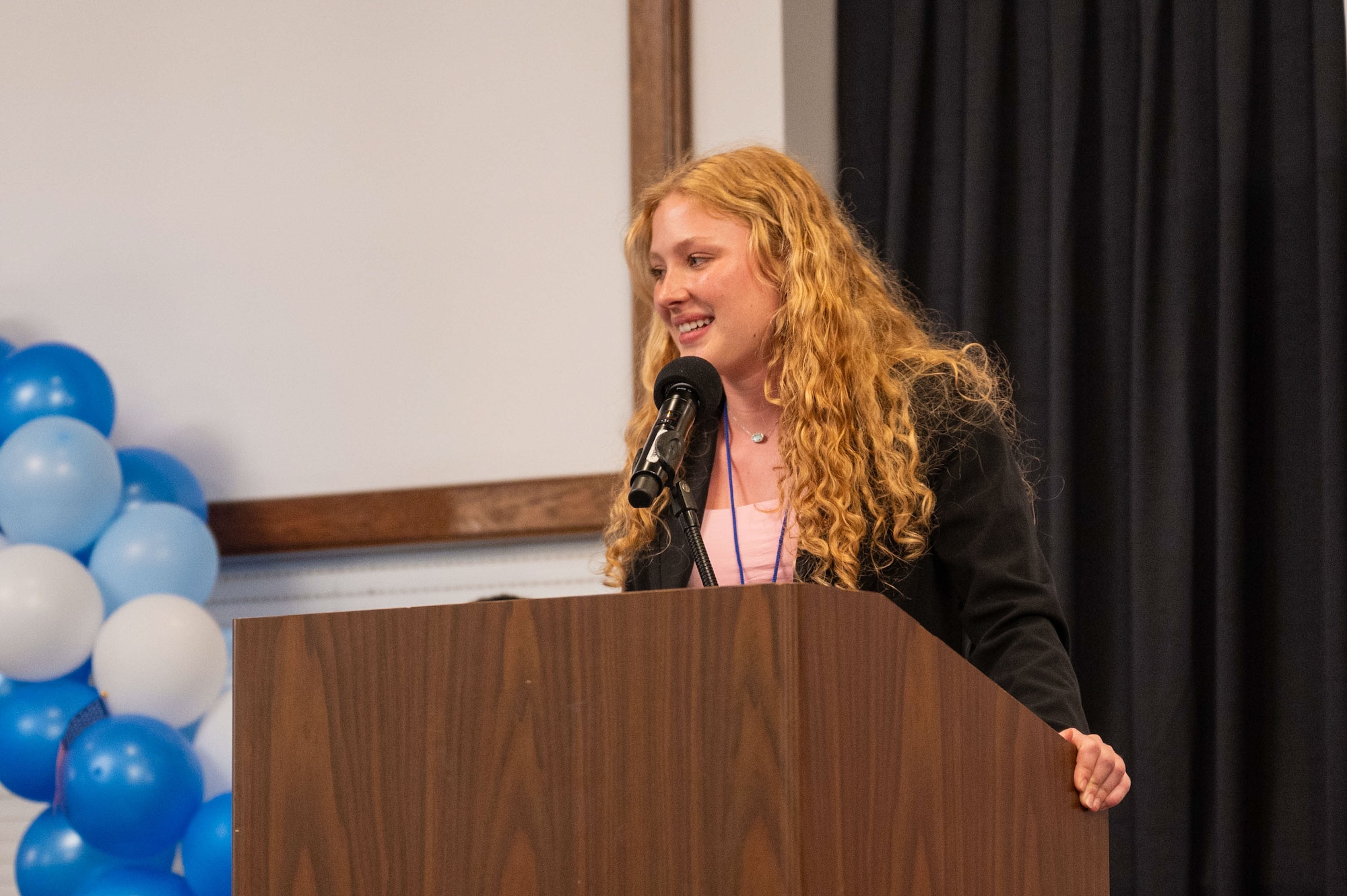 Avonlea S., age 17, Youth of the Year candidate from U.S. Army Garrison Italy-Vicenza Child and Youth Services, delivers a speech after winning the 2025 European Military Youth of the Year award at Ramstein Air Base, Germany, March 10, 2025. Ramstein hosted the MYOY competition and ceremony for contestants all throughout the U.S. European Command.