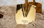 A commemorative shovel used during a groundbreaking ceremony for pier renovations at Coast Guard Base Boston, Massachusetts, April 14, 2022.Base Boston was one of last year's Customer Service Award honorees for transforming the base into an optimally supported Fast Response Cutter (FRC) homeport.