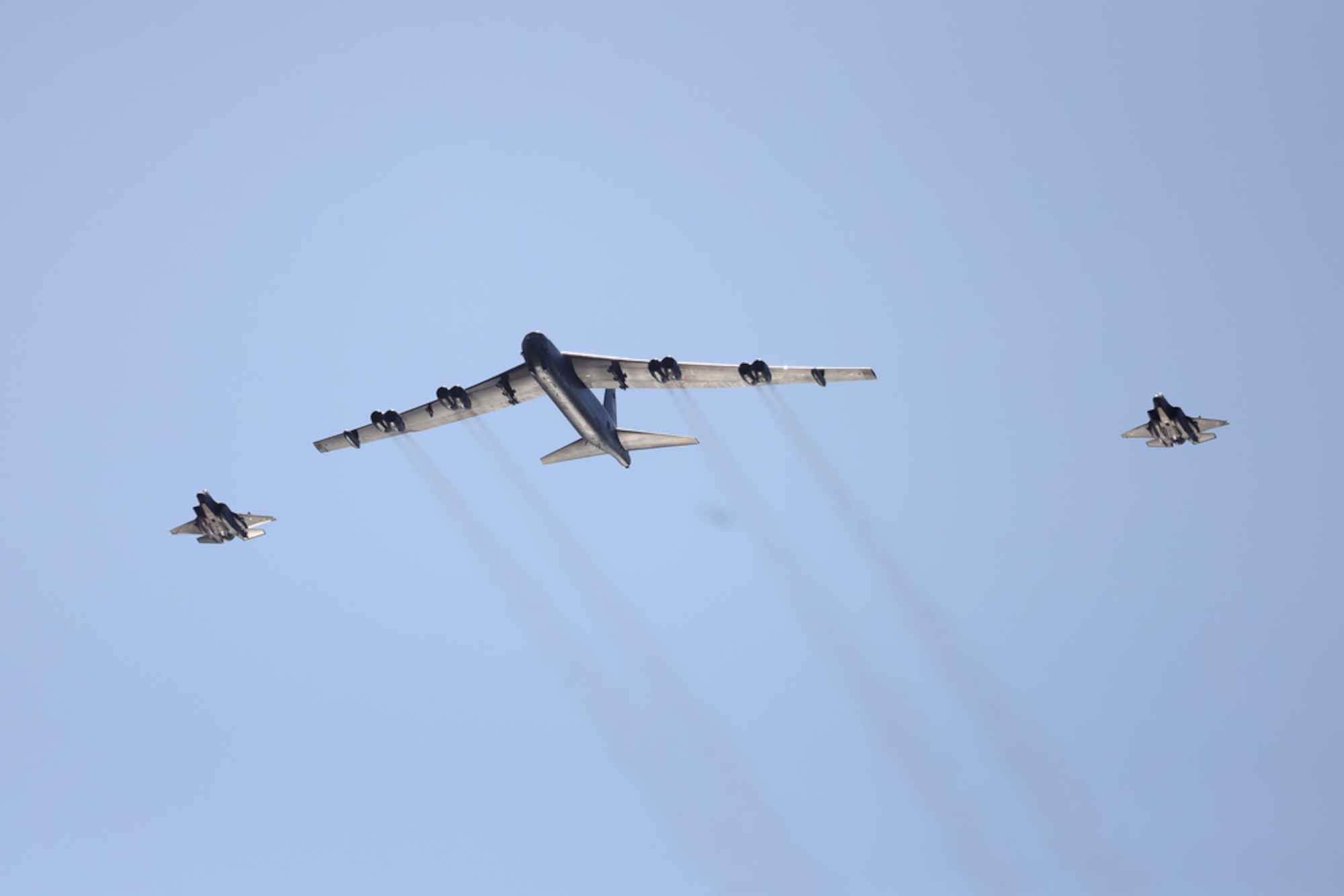 A U.S. Air Force B-52H Stratofortress conducts a low-pass over Oslo, Norway, alongside two Royal Norwegian Air Force F-35 Lightning IIs during Bomber Task Force 25-2 mission TOWER BLOCKHOUSE March 14, 2025. Bomber Task Force missions provide critical opportunities to integrate and train with regional partners. Integration Is a critical component of agile combat employment, allowing U.S. forces to adapt to evolving international security environments with speed and precision.  (Photo courtesy of the Norwegian Armed Forces)
