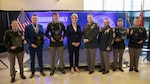 Four Southwestern Oklahoma State University Guard Officer Leadership Program Development officer candidates and Statton Mantz, a student lifeguard at SWOSU, pose for a photo with SWOSU President, Dr. Diana Lovell, Maj. Gen. Thomas H. Mancino, adjutant general for Oklahoma, and Command Sgt. Maj. John Hernandez, the state command sergeant major for Oklahoma, Wednesday, March 12, 2025, in Weatherford, Oklahoma. The five students were presented with awards for saving the life of a GOLD officer candidate during training. (Oklahoma National Guard photo by Sgt. Tyler Brahic)